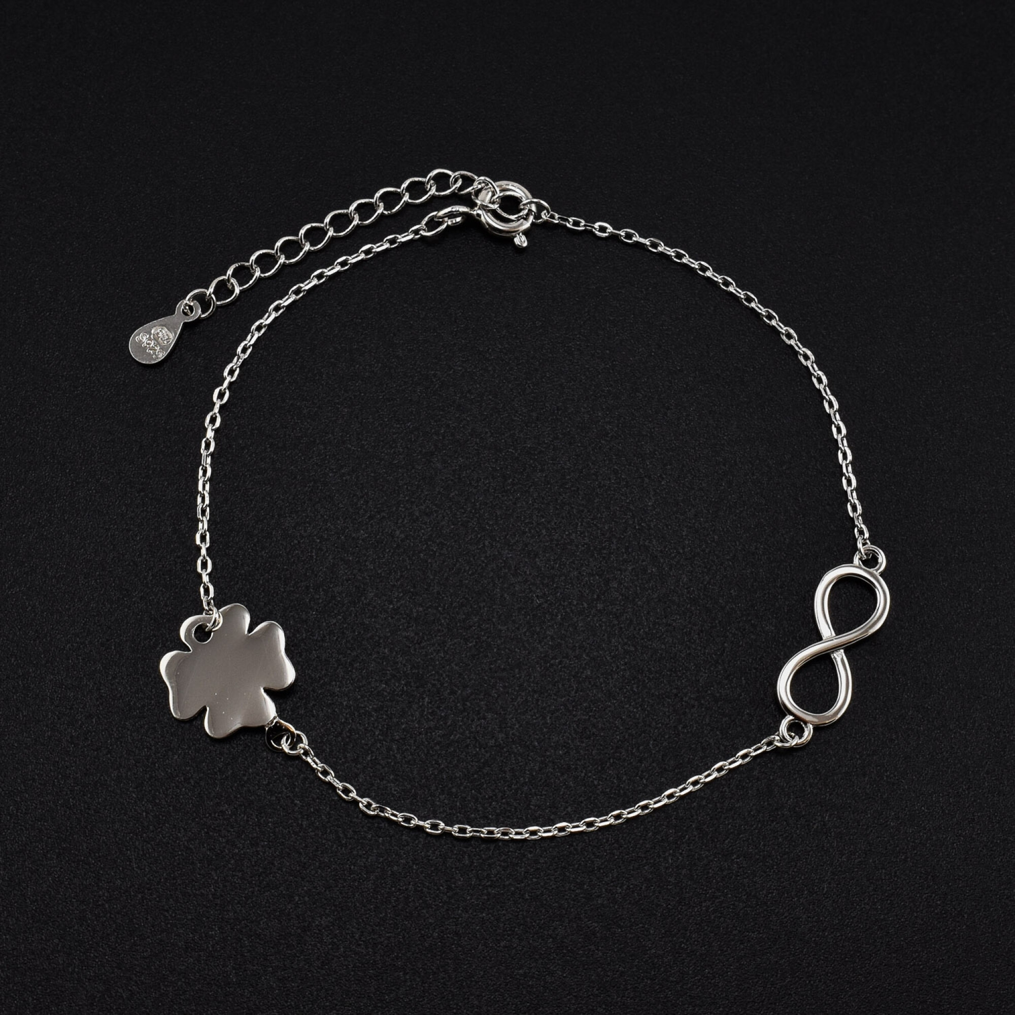 Bratara dama din argint cu accesorii in forma de infinit si trifoi cu patru foi