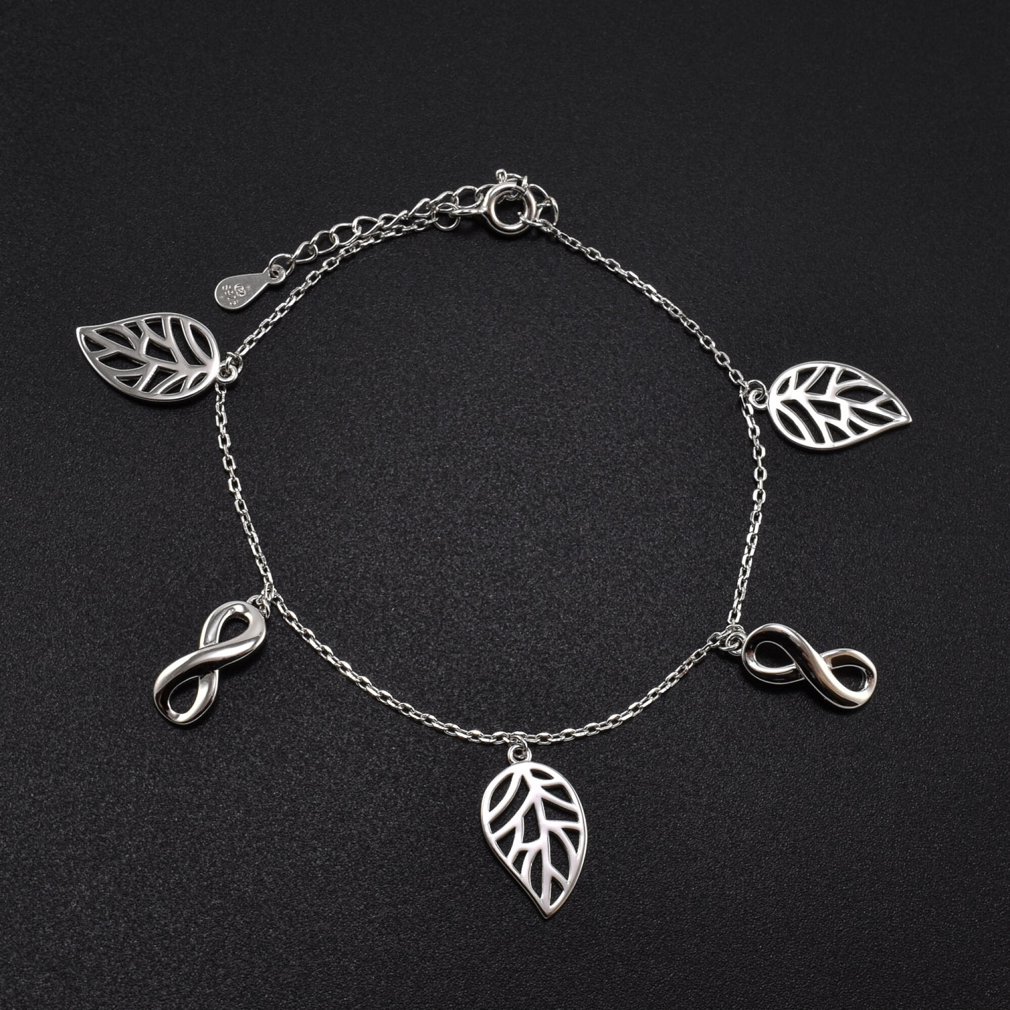 Bratara dama din argint cu accesorii in forma de frunza si infinit