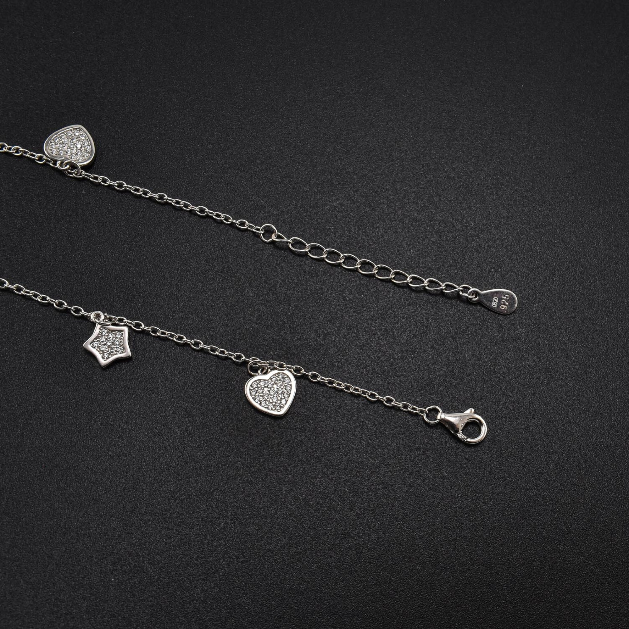 Bratara dama din argint cu accesorii in forma de stea si inima acoperite cu cristale swarovski