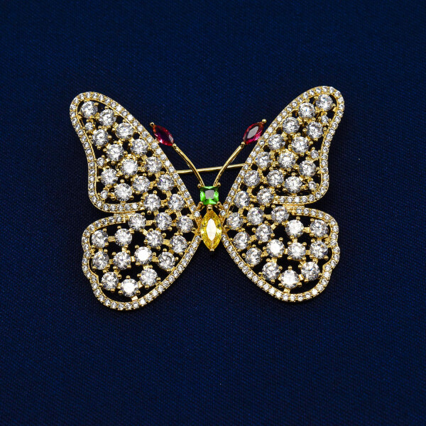 Brosa in forma de fluture cu cristale swarovski, placata cu aur 18k