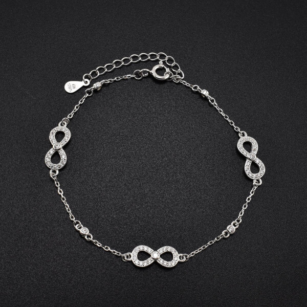 Bratara dama din argint cu accesorii in forma de infinit acoperite cu cristale swarovski