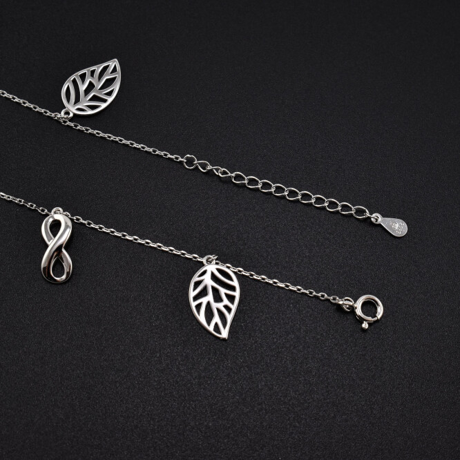 Bratara dama din argint cu accesorii in forma de frunza si infinit