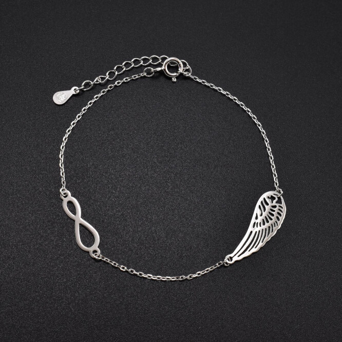 Bratara dama din argint cu accesorii in forma de infinit si aripa