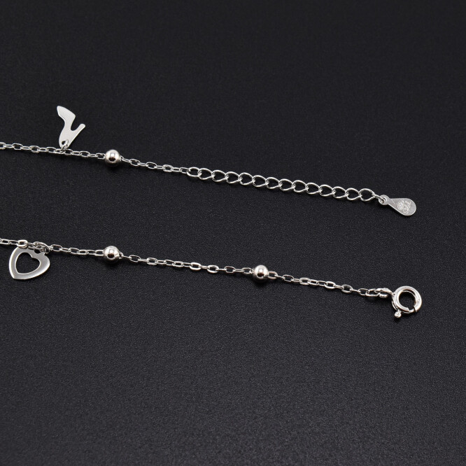 Bratara dama din argint cu accesorii in forma de inima, banut, stea